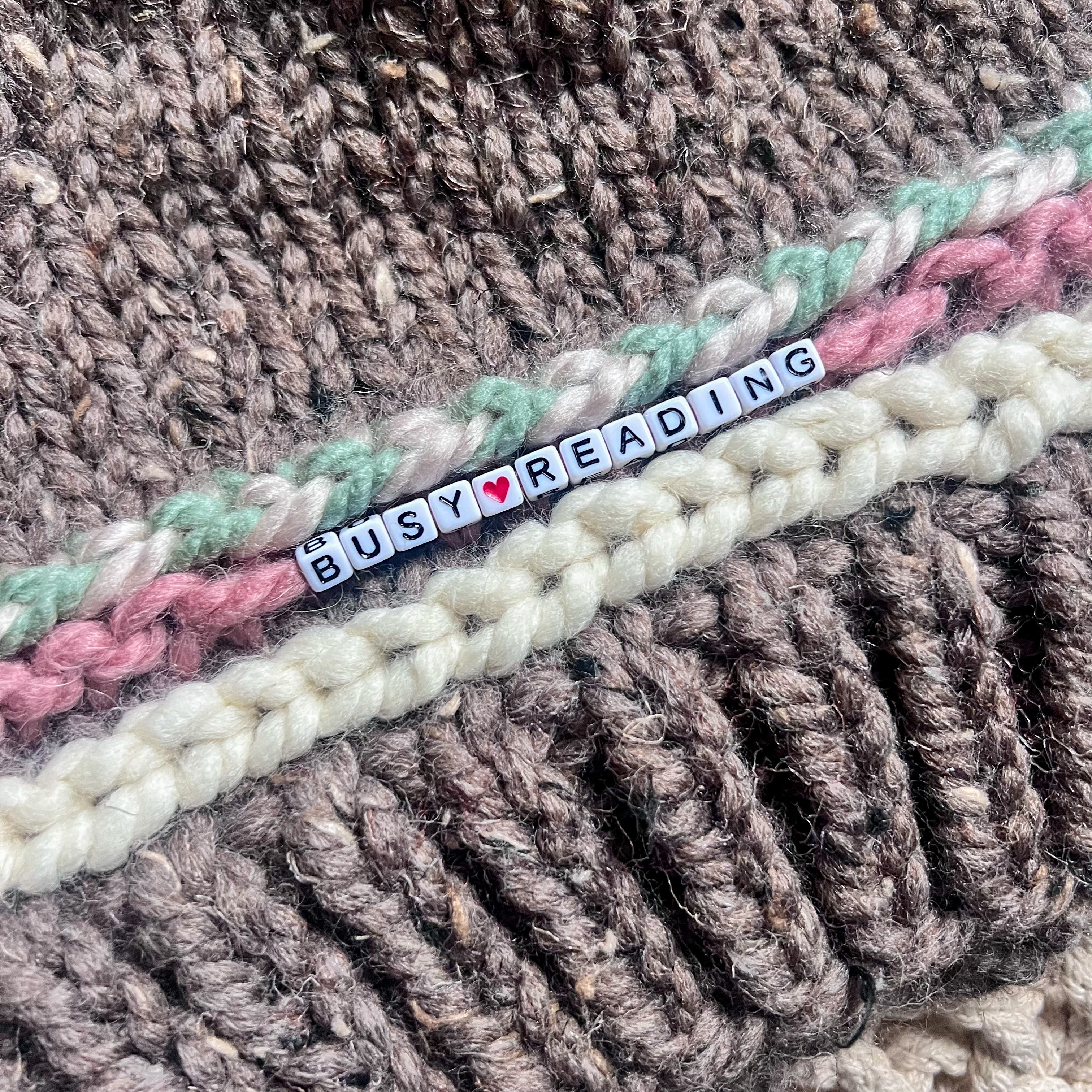 Friendship Bracelet Knitted Beanie - Busy Reading