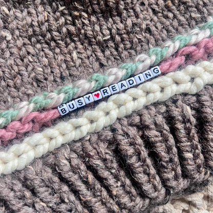 Friendship Bracelet Knitted Beanie - Busy Reading