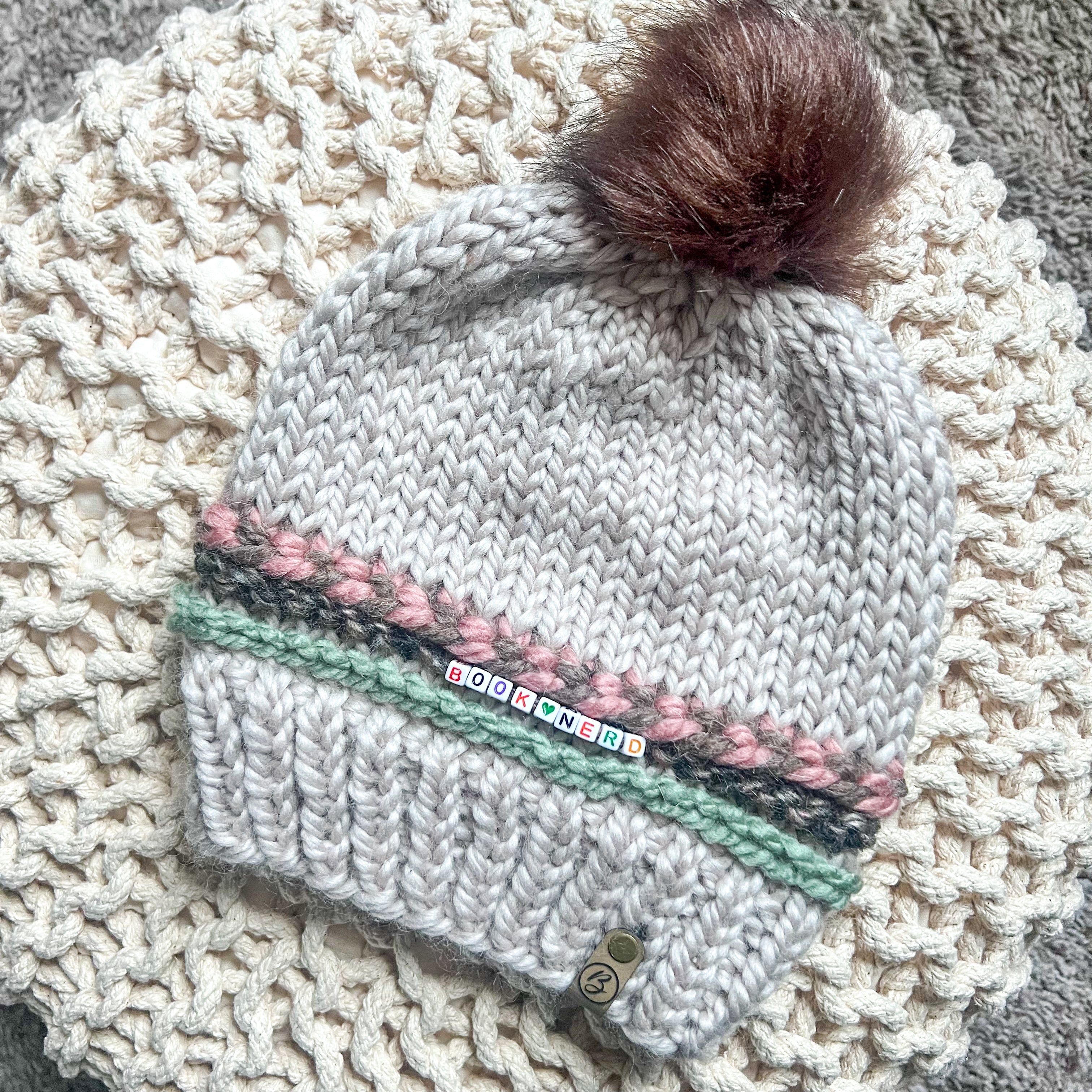 Friendship Bracelet Knitted Beanie - Book Nerd