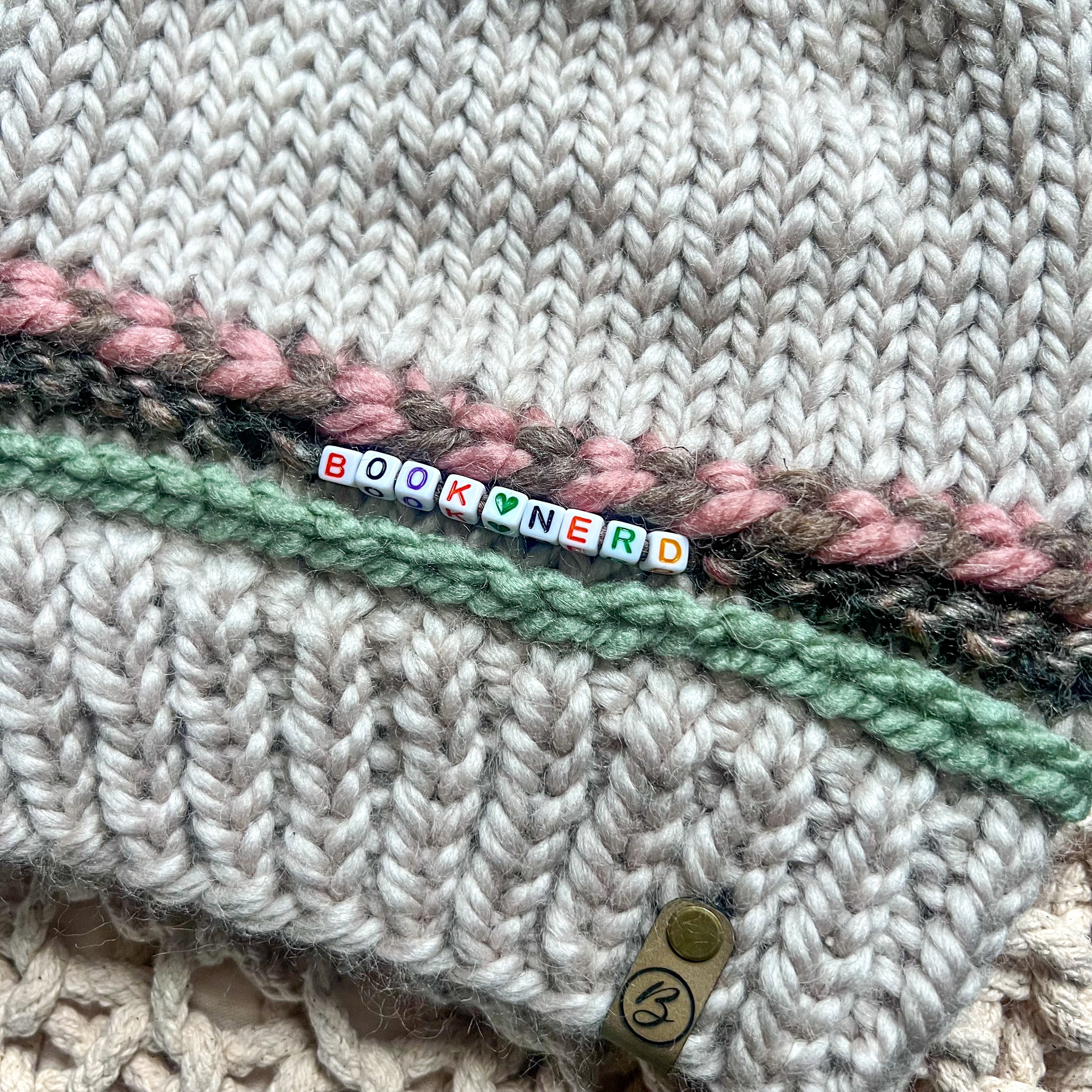 Friendship Bracelet Knitted Beanie - Book Nerd